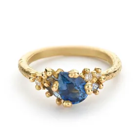 Pear Cut Blue Sapphire and Diamond Sweeping Cluster Ring